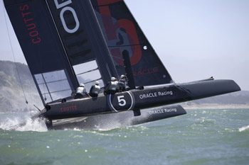 America's Cup AC45 catamaran on a wave in San FRancisco Bay. Photo copyright 2011 Gilles Martin-Raget americascup.com