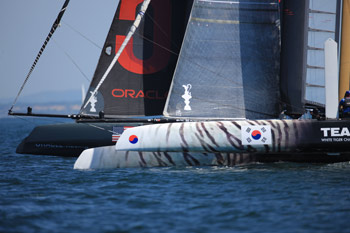 Korea knocked Russell Coutts and Oracle 5 out of the quarterfinals, but lost to ETNZ in the semis. Photo:©2011 Gilles Martin-Raget/americascup.com