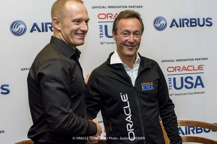 James Spithill (L), Skipper of 2017 America's Cup Defender Oracle Team USA, greets Fabrice Brgier, President and CEO of Airbus, as they announce a renewed partnership to share technical innovations.