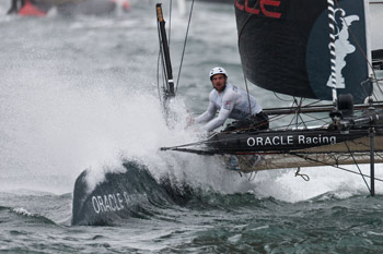  Oracle Racing AC45 slices through the waves in San Diego. Photo:2011 ACEA/Gilles Martin-Raget