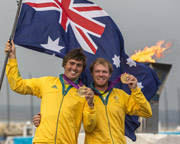 Nathan Outteridge with teammate Iain Jensen. Photo:2012 Daniel Forster/go4image.com