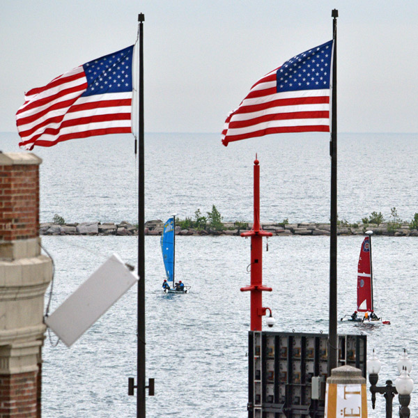 The AC Endeavour program gave local school children the chance to sail in Hobie Wave catamarans.  In a nod to the city, each boat received a sail decorated with the colors and logos of Chicago sports teams. Photo:©2016 CupInfo.com