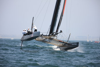 Both Oracle boats sailed well, but not fast enough to catch Artemis, which found success in Race 1. Photo:©2011 Gilles Martin-Raget/americascup.com