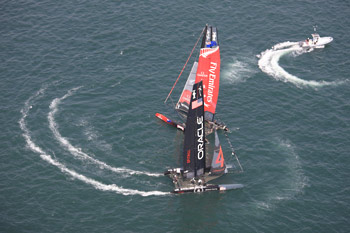 Despite appearances, ETNZ sailed a circle round Oracle4 when it counted to win their match race, Friday. Photo:©2011 Gilles Martin-Raget/americascup.com